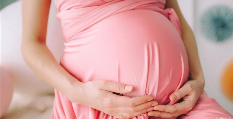 ما هي أعراض الحمل بعد التبويض بيوم؟